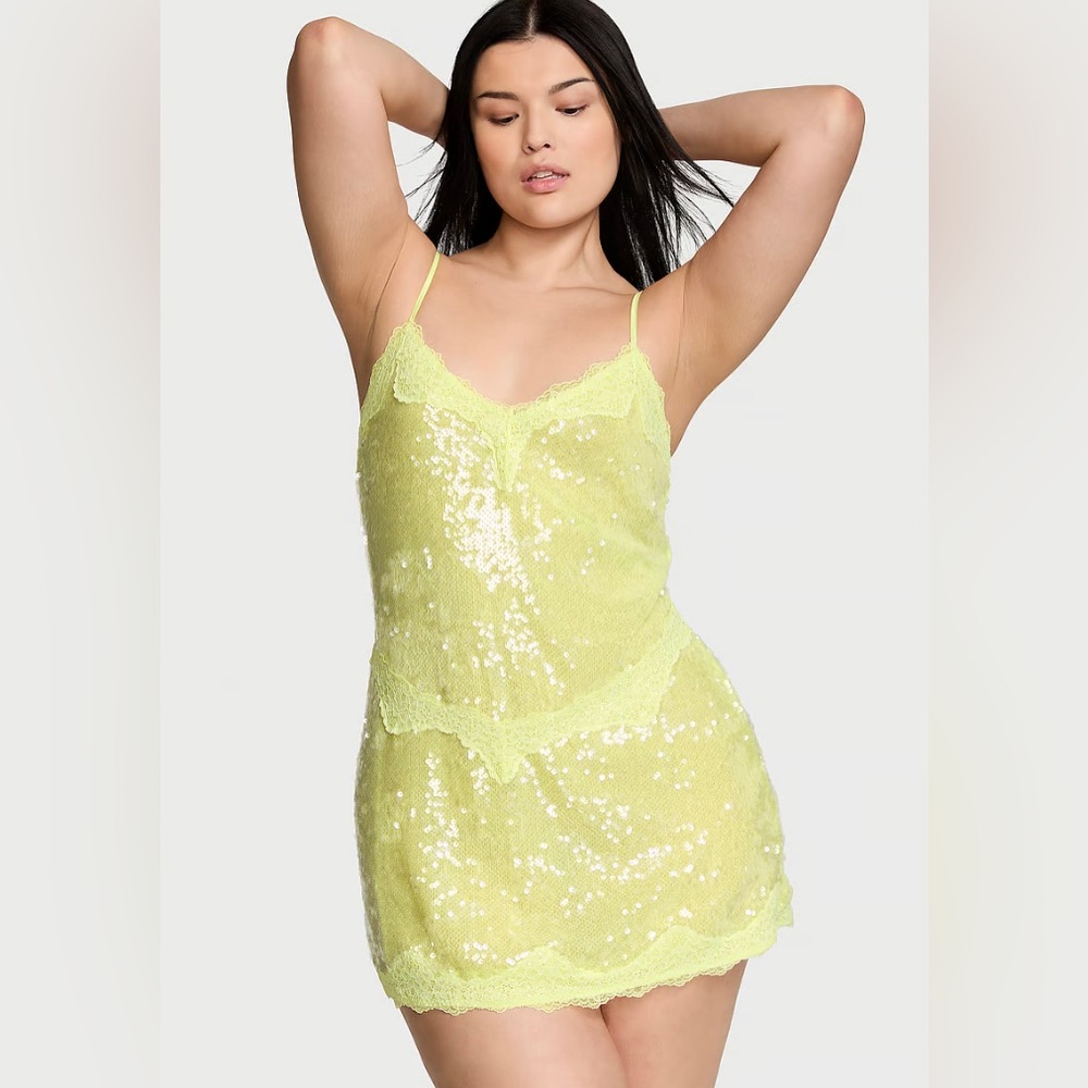 Victoria’s Secret sequined mini slip dress. It’s new with tags!